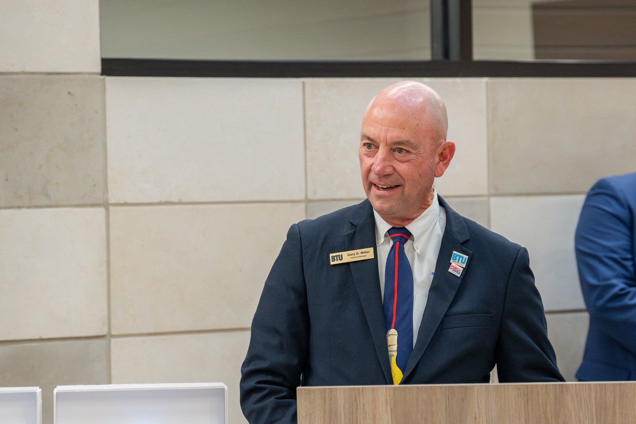 Image of Gary Miller speaking at the building dedication for BTU's new administration building in 2025.