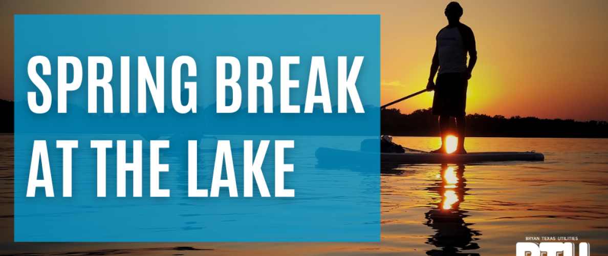 Spring Break at the Lake, a paddle boarder at lake Bryan during sunset